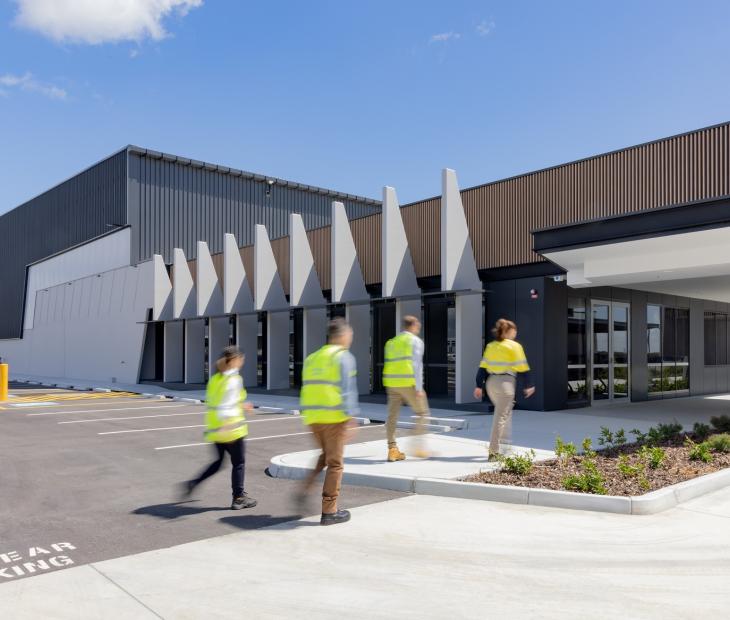 Team walking into building - Brisbane Airport