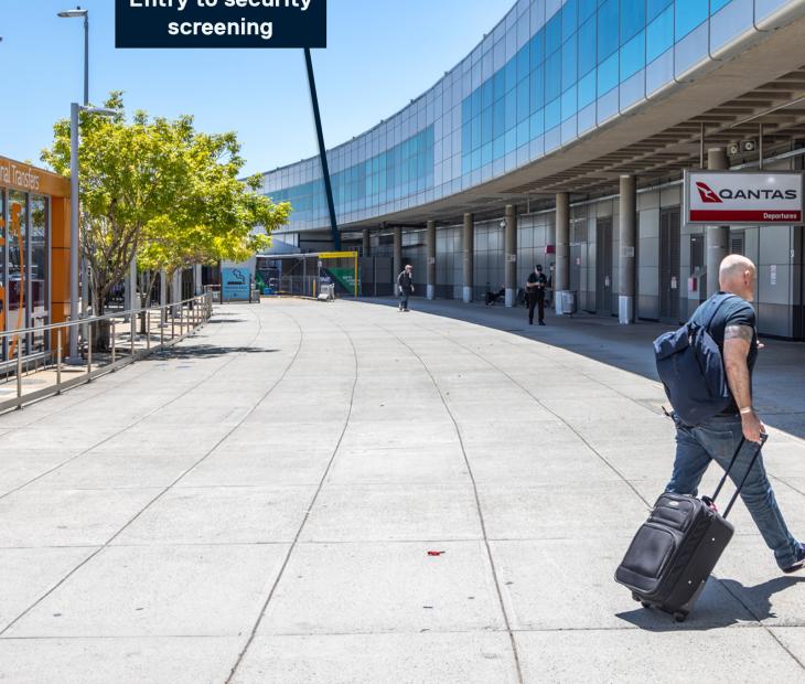 Temporary security screening location at Qantas end of the terminal