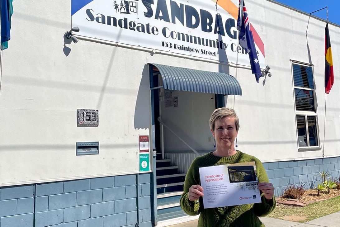 SANDBAG's Erin Williams standing in front of the Sandgate Community Centre