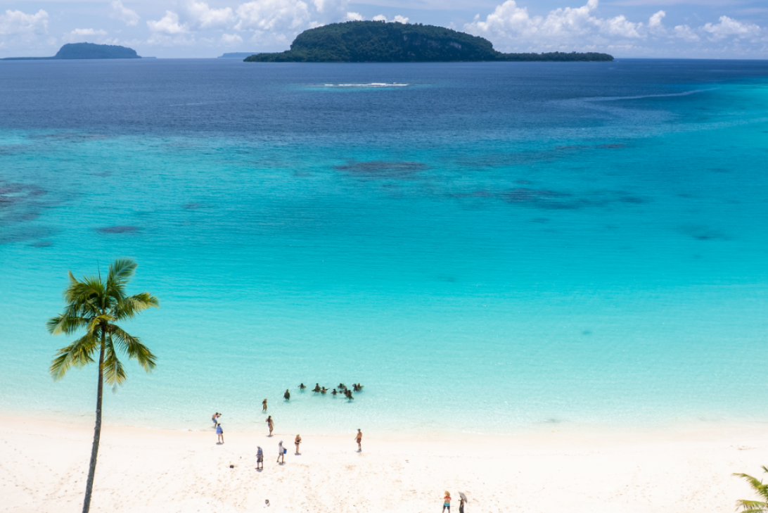 People on Champagne Beach, Santo, Vanuatu